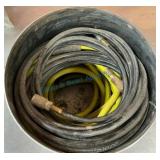 Coiled Industrial Hoses in Metal Container