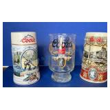Three Coors-Themed Beer Steins