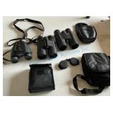 Three Binoculars With Cases
