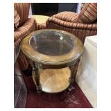 Oval shaped glass top table