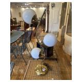 Three globe brass lamp