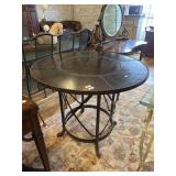 Round metal studded table