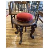 Red upholstered stool