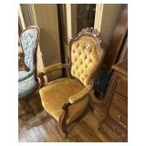 Yellow upholstered armchair