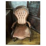 Pink upholstered armchair