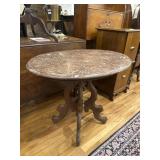 Oval marble top table