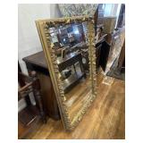 Ornate gold mirror