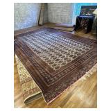 Red, tan and green large area rug