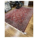 Red, blue and tan Rug
