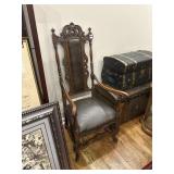 Leather upholstered armchair
