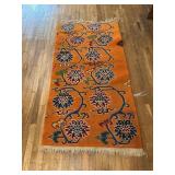 Orange and blue flower design Rug