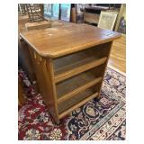 Small three shelf table on wheels