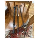 Three wooden canes