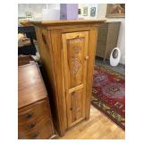 Carved wooden cabinet