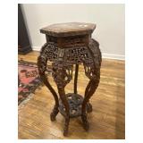 Carved oriental hardwood stand