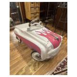 Pink and white flames pedal car
