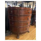 Half round chest of drawers