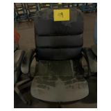 Black Office Task Chair with Significant Wear
