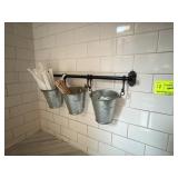 Wall hangers with metal buckets