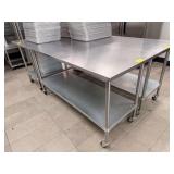 6 FT X 30 INCH SS TABLE ON CASTER W/ UNDERSHELF