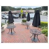 Four Black Metal Patio Tables with Umbrellas