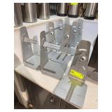 Eight Metal Jug Holder Racks