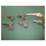 over view of hand guns