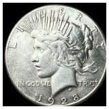 1928 Silver Peace Dollar ABOUT UNCIRCULATED