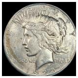 1928 Silver Peace Dollar NEARLY UNCIRCULATED