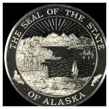 This is a silver round featuring the Seal of the S