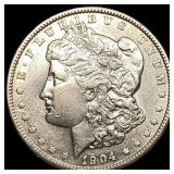 This is a 1904 Morgan Silver Dollar. CLOSELY UNCIR