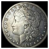 1892-CC Silver Morgan Dollar NEARLY UNCIRCULATED