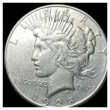 1928 Silver Peace Dollar ABOUT UNCIRCULATED