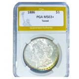 1886 Morgan Silver Dollar PGA MS63+ Toned