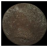 The coin is too worn to accurately identify. NICEL