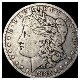 1886-O Silver Morgan Dollar ABOUT UNCIRCULATED