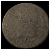 The coin is too worn to accurately identify. NICEL