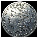 1886-O Silver Morgan Dollar ABOUT UNCIRCULATED