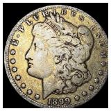 1899-O Micro O Silver Morgan Dollar ABOUT UNCIRC