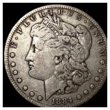 1884 Morgan Silver Dollar ABOUT UNCIRCULATED
