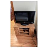 OAK CABINET WITH LG TV 23' TALL X 35' X 19'