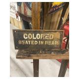 Early Cast Iron Colored Seated in Rear Sign