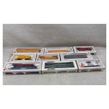 9 Bachman ho scale train carts and box of tacks