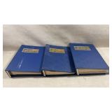 three binders containing issues of Model