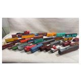 collection of 34 HO scale model train cars