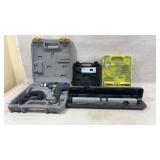 Ryobi power drill plugged in and turned on, ryobi