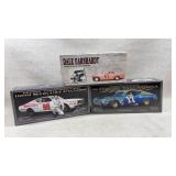 3 die cast model cars in boxes
