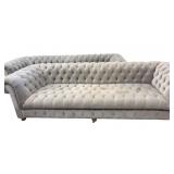 2 Grey Tufted Sofas with Wheels - both need spot