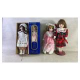 Four porcelain dolls