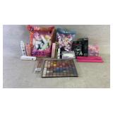 Assortment of makeup and makeup accessories like